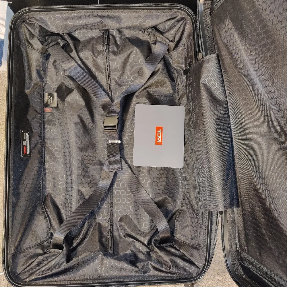 Tumi •upgrade your